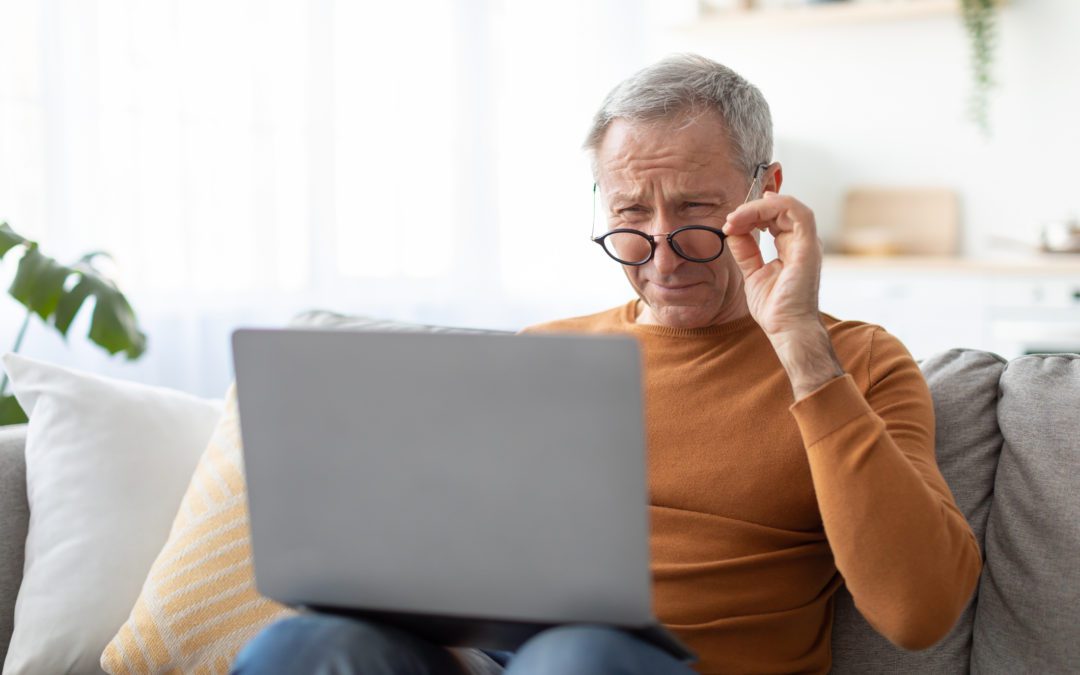 A senior struggling with poor eyesight