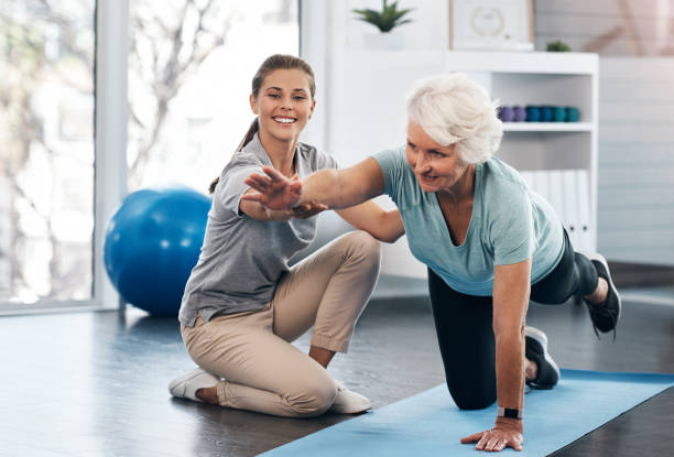 Old woman doing physical therapy