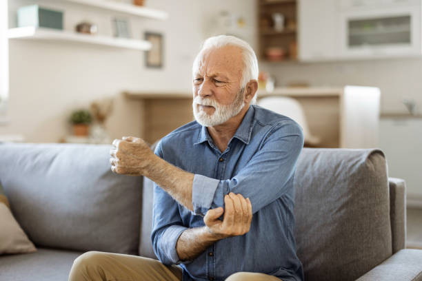 An elderly man in pain