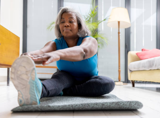 Old woman doing physical therapy