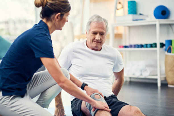 old man doing physical therapy